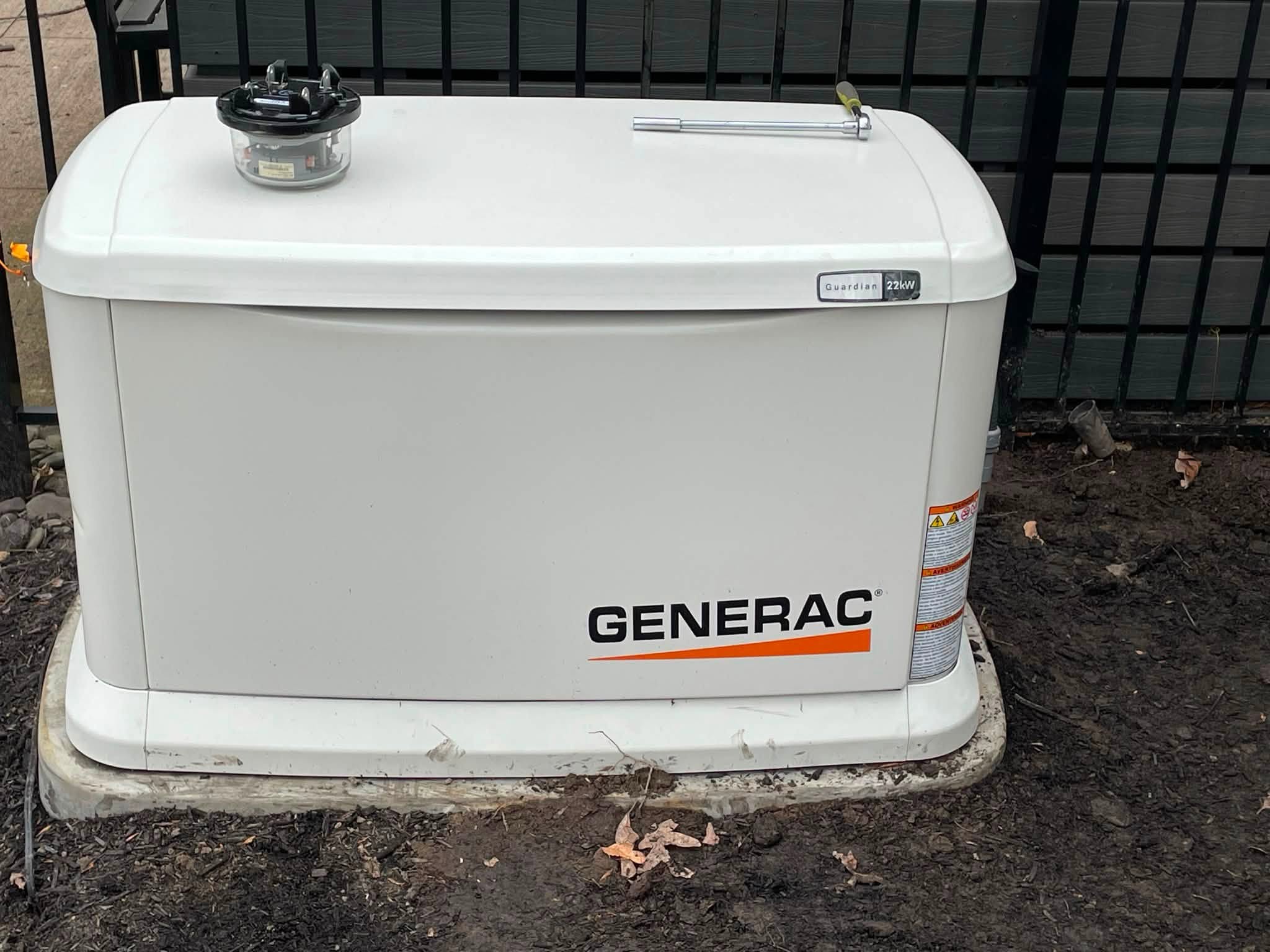 Top and front view of a Generac Guardian standby generator